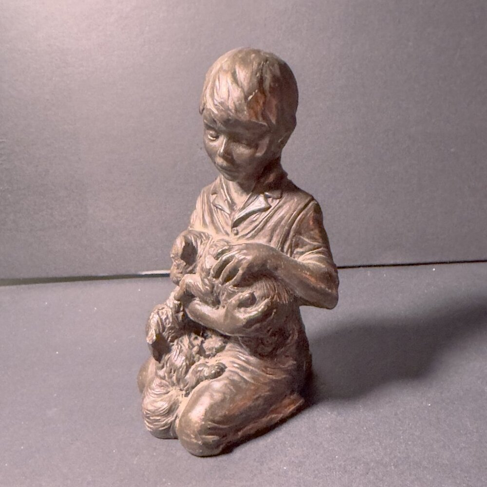 "Boy with Puppies" figurine